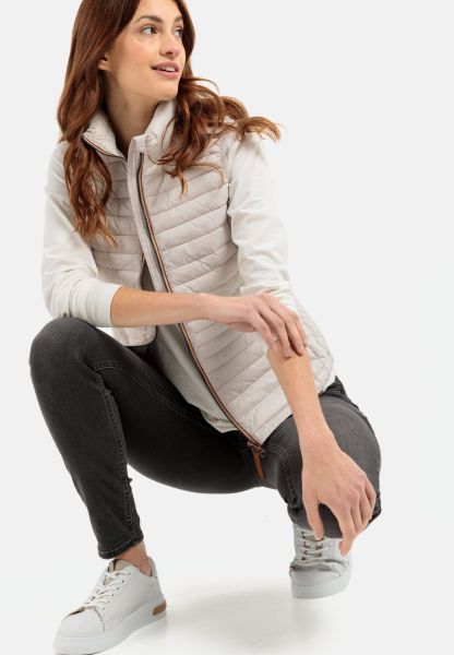 Quilted Vest Made From 100% Recycled Material Jackets & Vests White Womenswear Camel Active Ignite